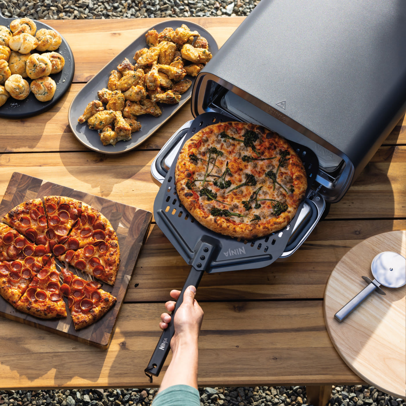 Image of Ninja Outdoor Artisan Pizza Oven feed a crowd